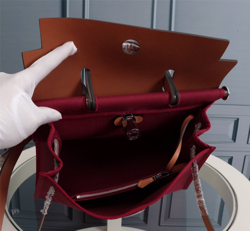 HM HERBAG ZIP 31 WINE RED AND COPPER CANVAS