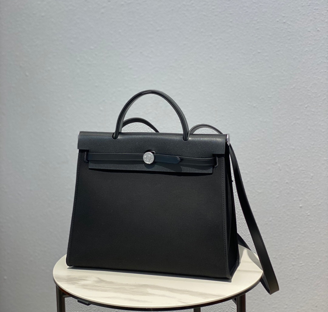 Herbag 31 Toile Black Canvas Black Cowhide Leather