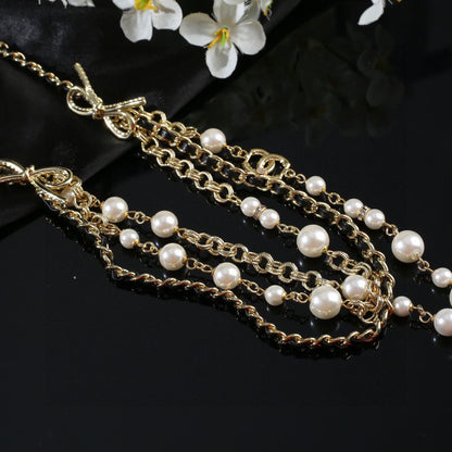 CHANEL 25S GOLD CHAIN BELT WITH PEARL 610440