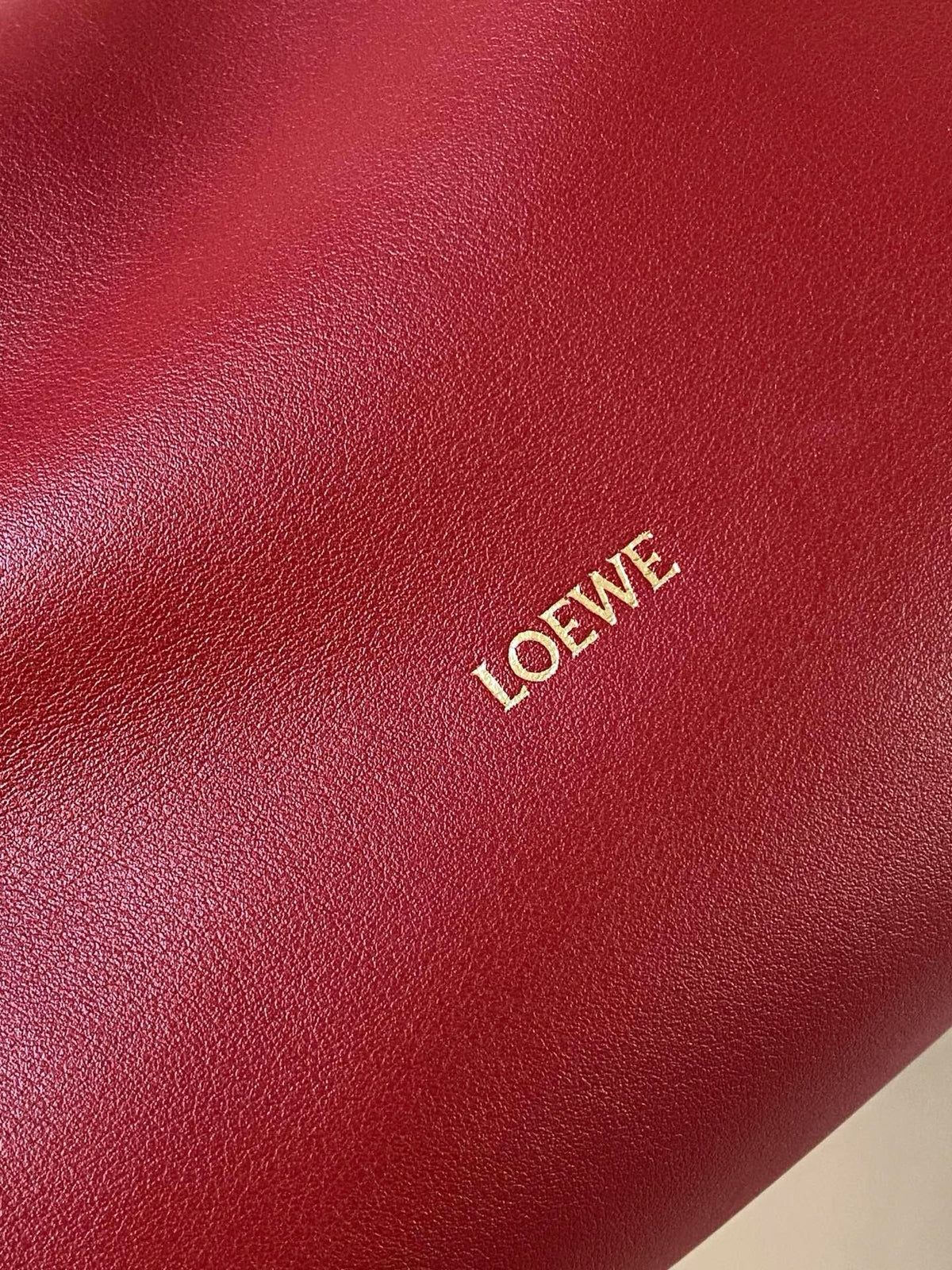 Loewe Coil Flamenco Medium Leather Clutch Red Leather