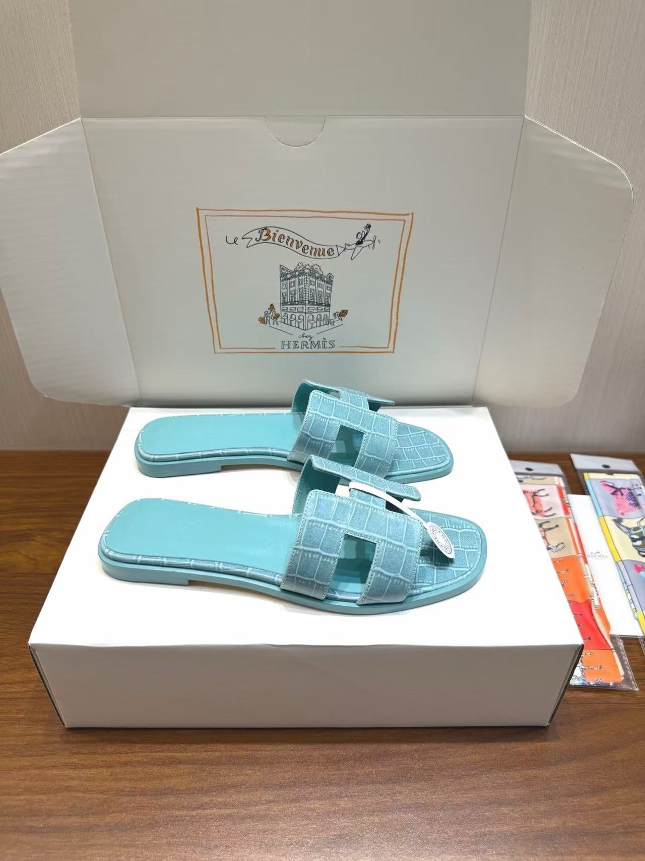 HM 26s Oran Slides Light Blue Crocodile-Embossed Leather