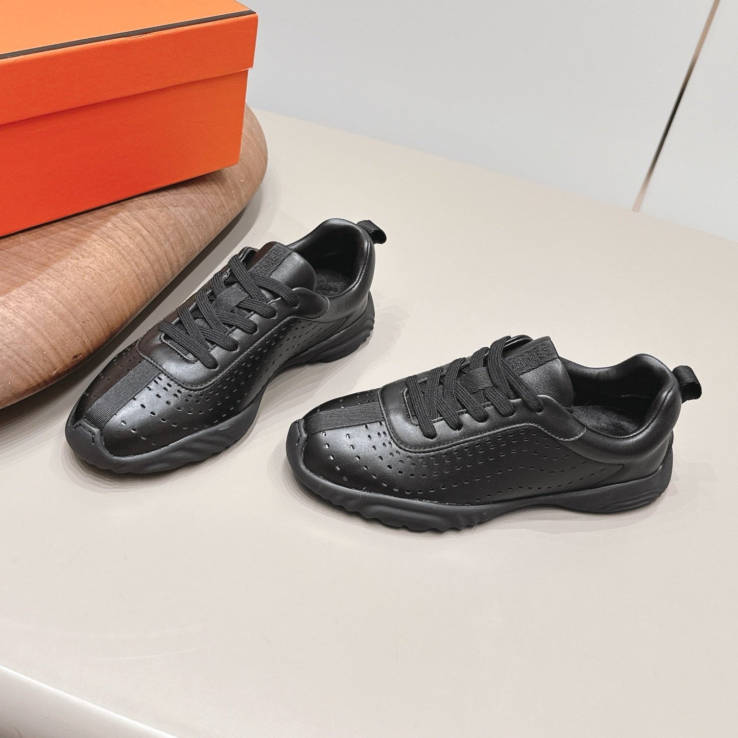 HM 26s Trail Sneakers In Black Perforated Calfskin