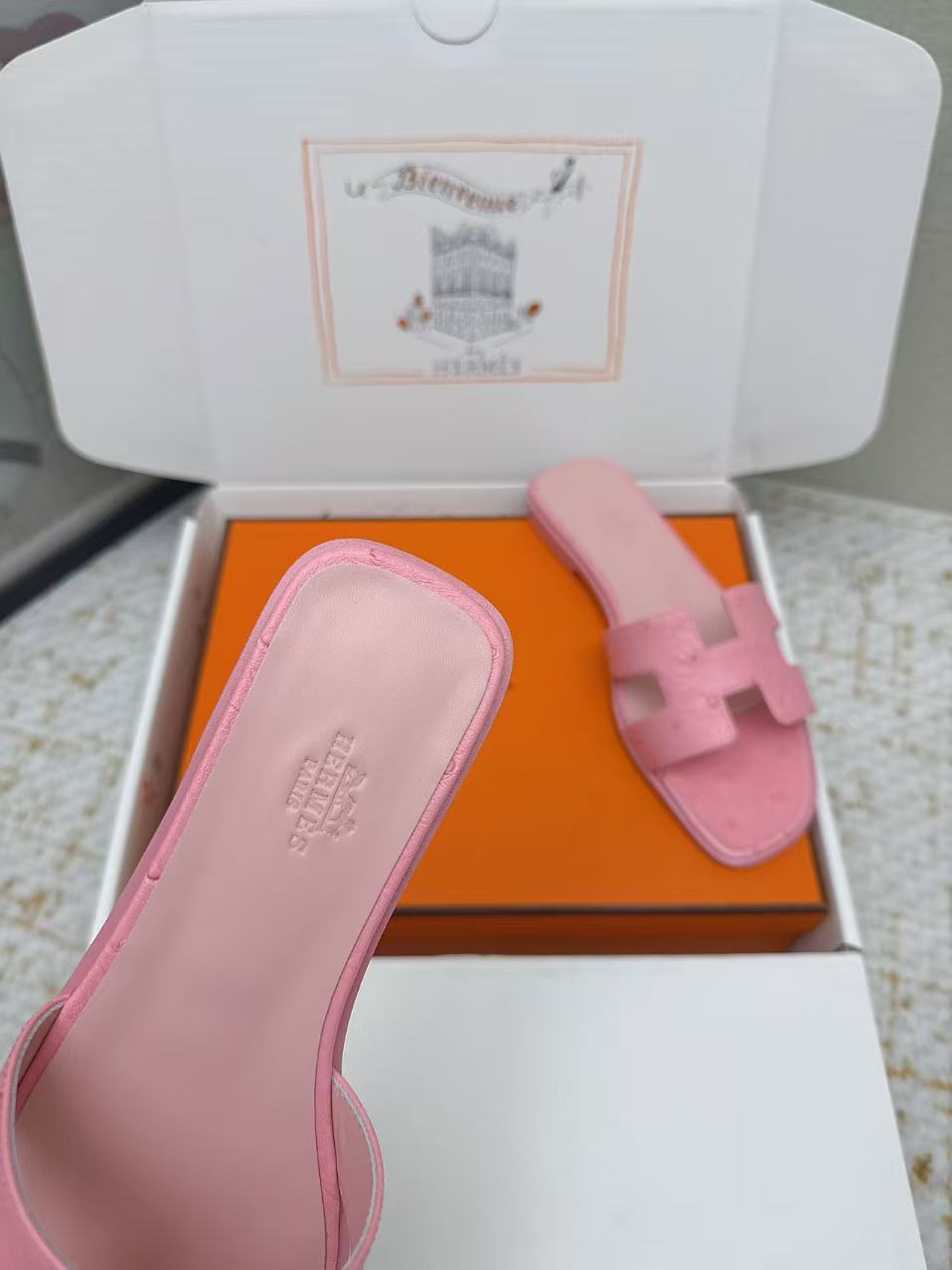 HM 2025 Oran Sandal Pink Ostrich Embossed Calfskin