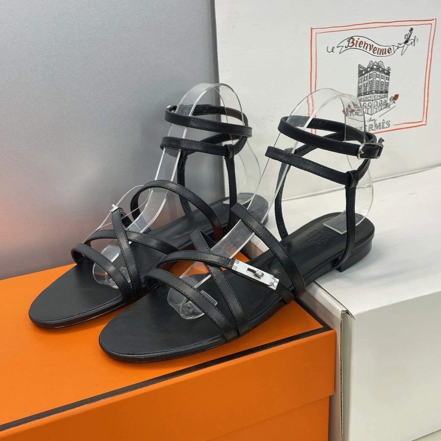HM 26ss Kelly Sliver Buckle Sandals Black Calfskin 607161