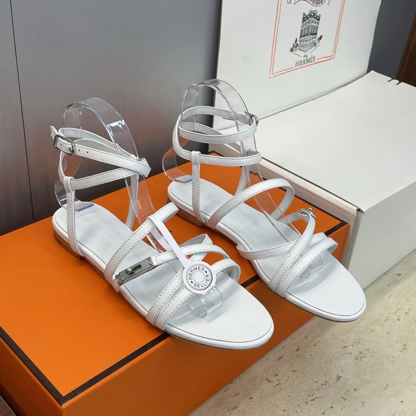 HM 26ss Kelly Sliver Buckle Sandals White Calfskin 607160