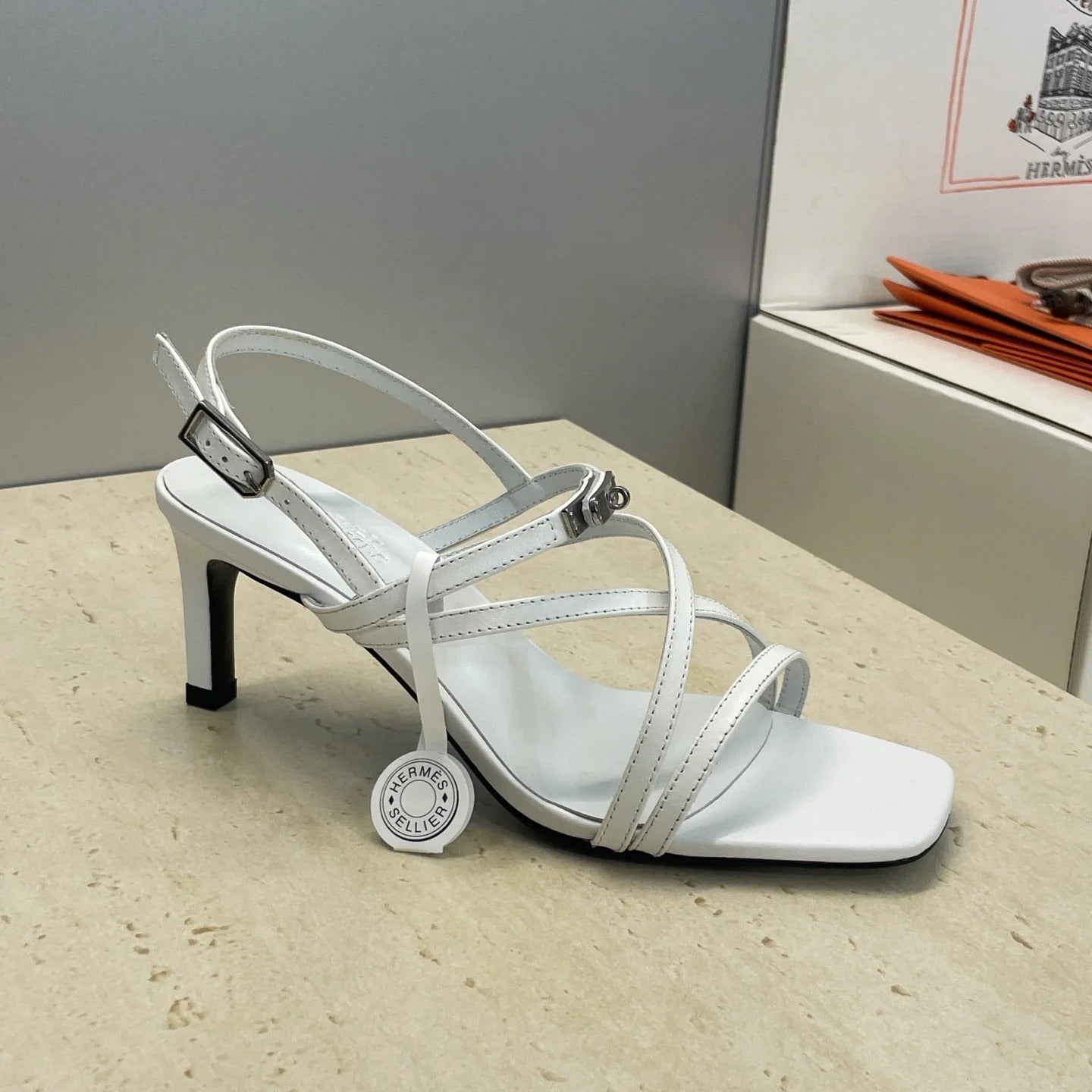 HM 26ss Kelly Sliver Buckle Sandals 65 White Calfskin 607168